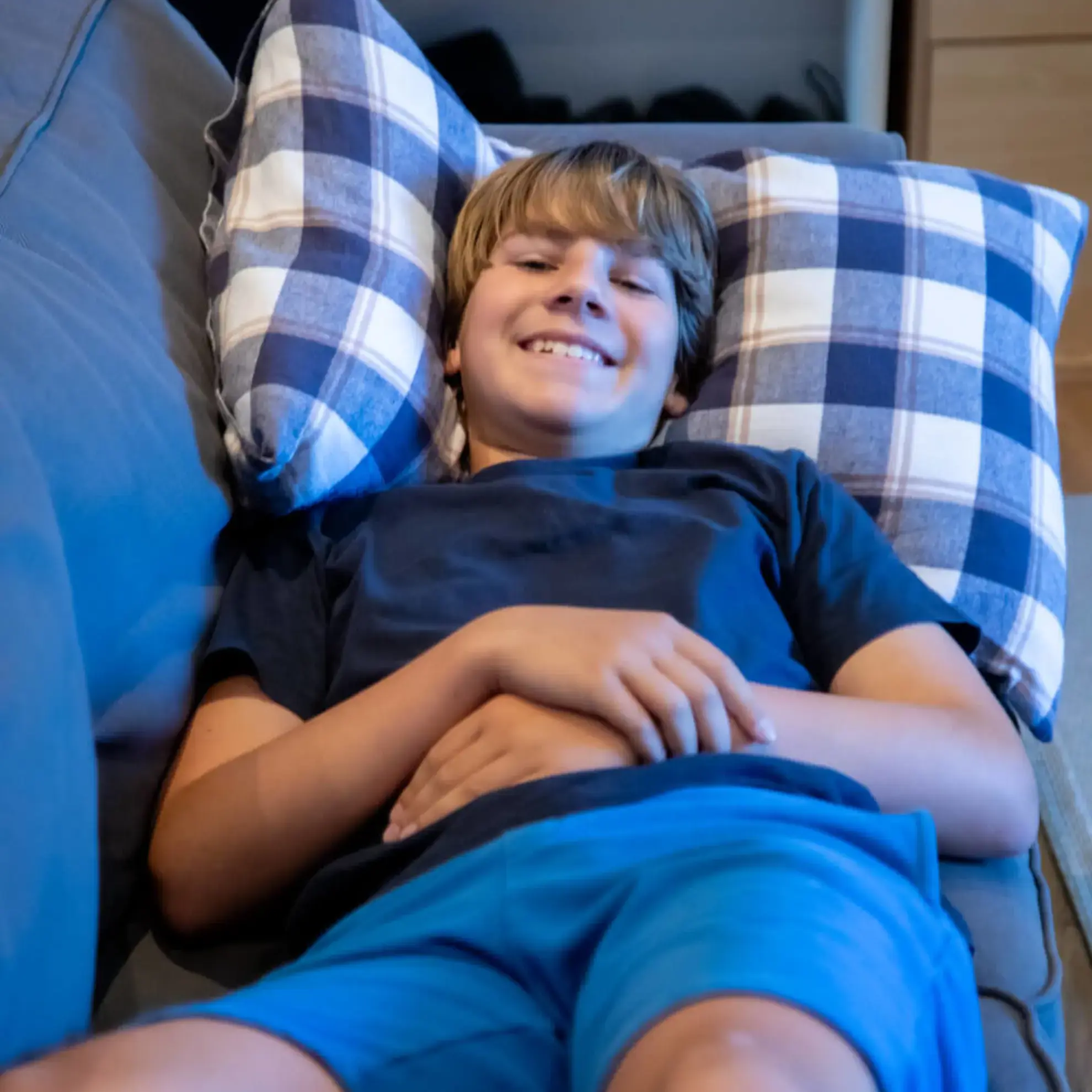 Boarding Pupil relaxing in Family Room Feltonfleet Private School Surrey