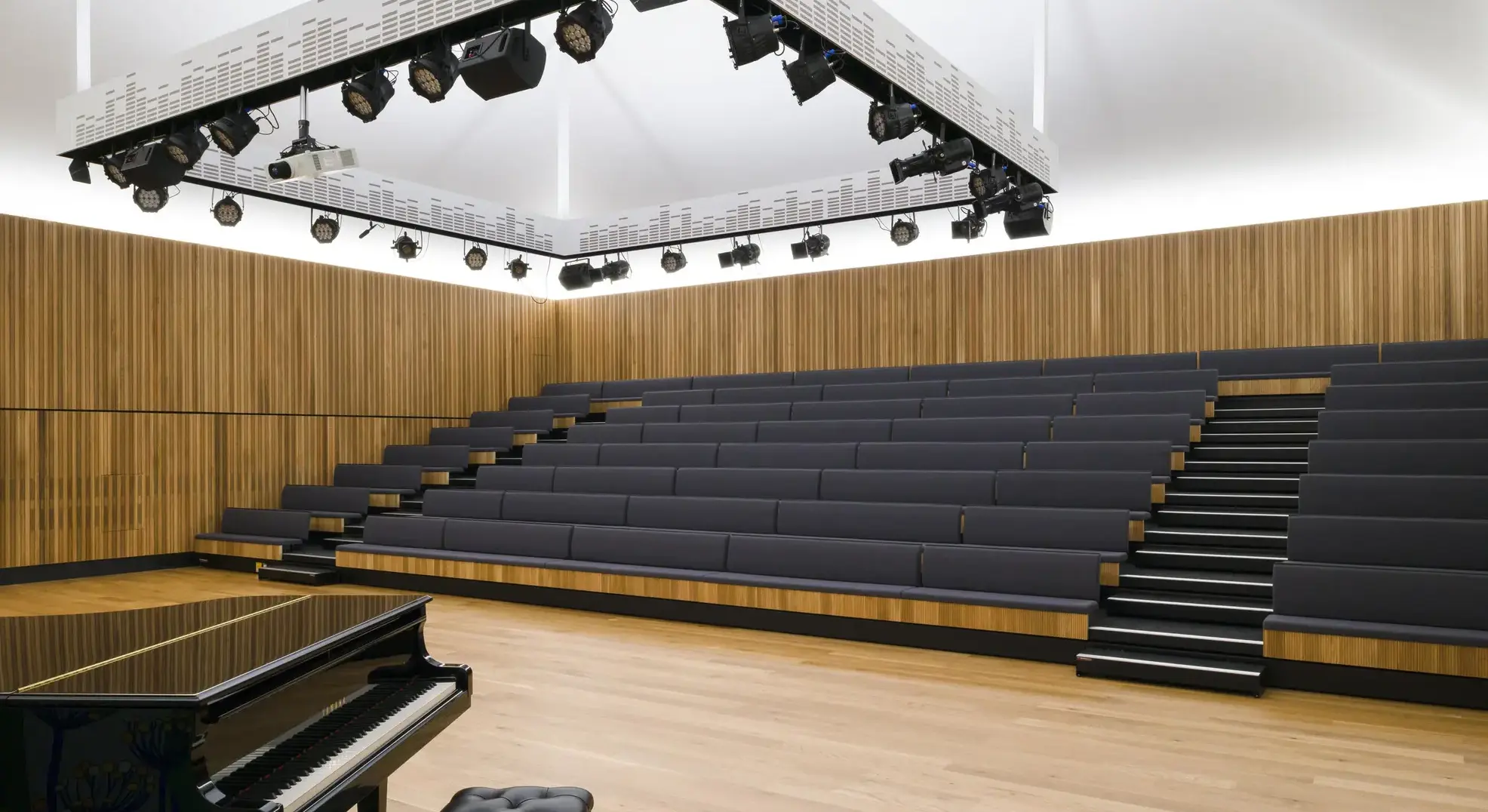 Empty Ashbee Theatre, complete with black piano