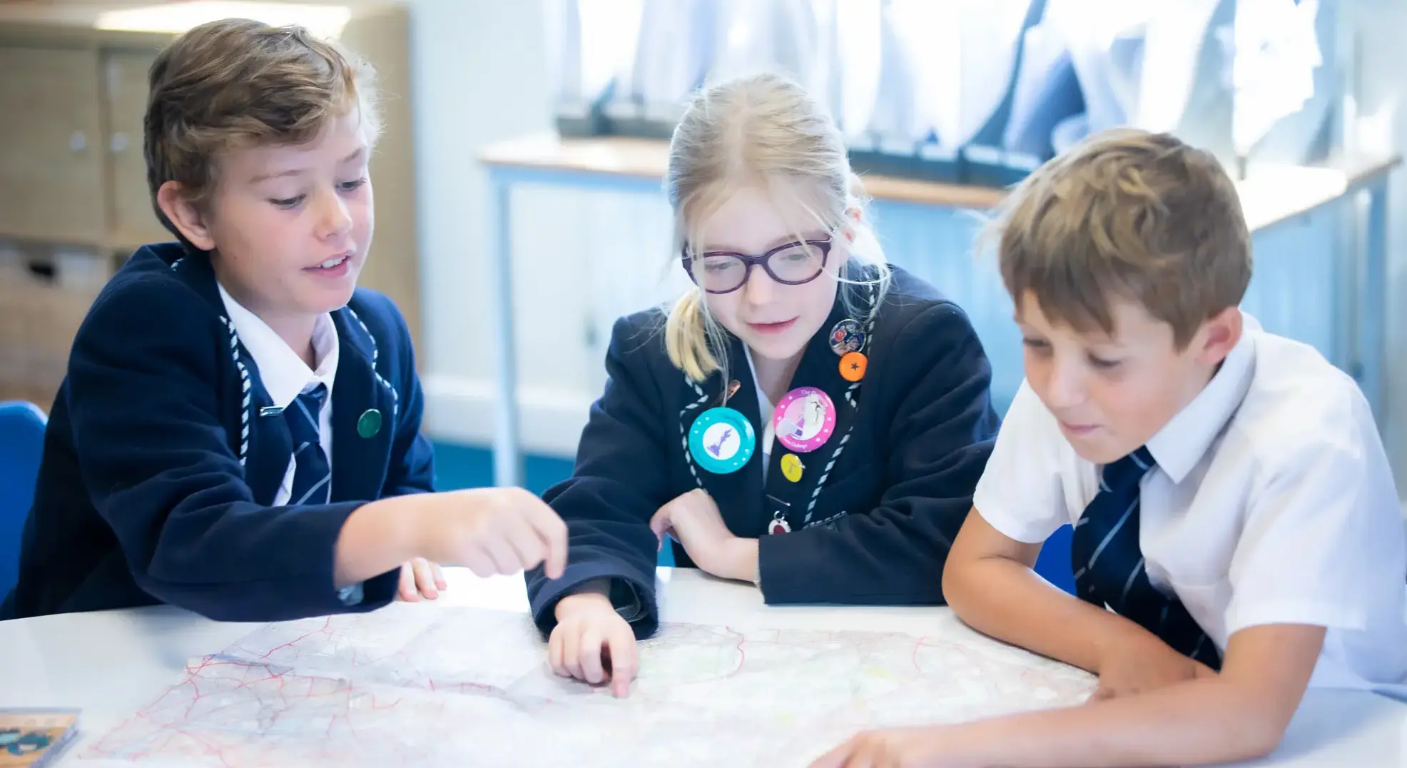 Students reading a map together