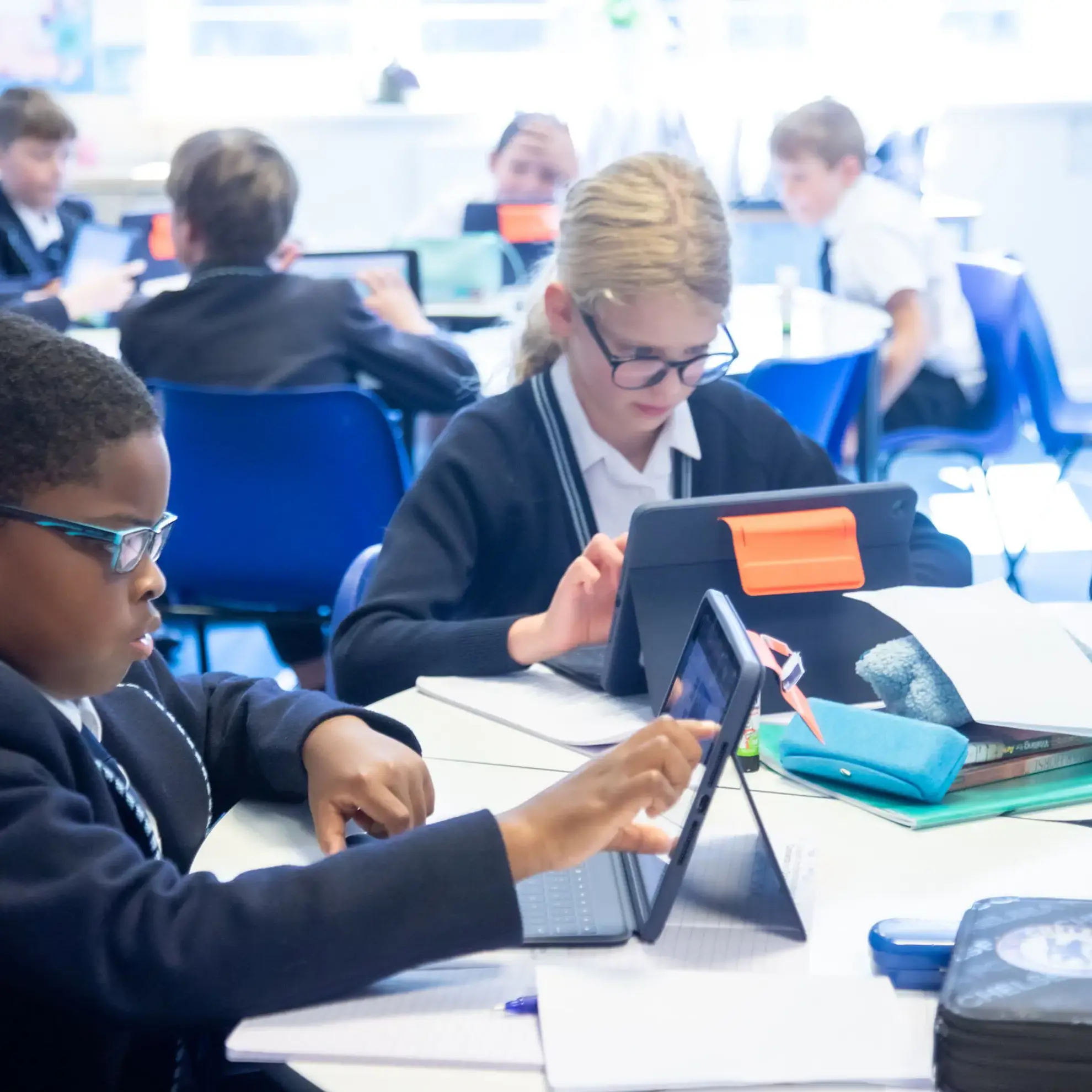 Students working on iPads in classroom