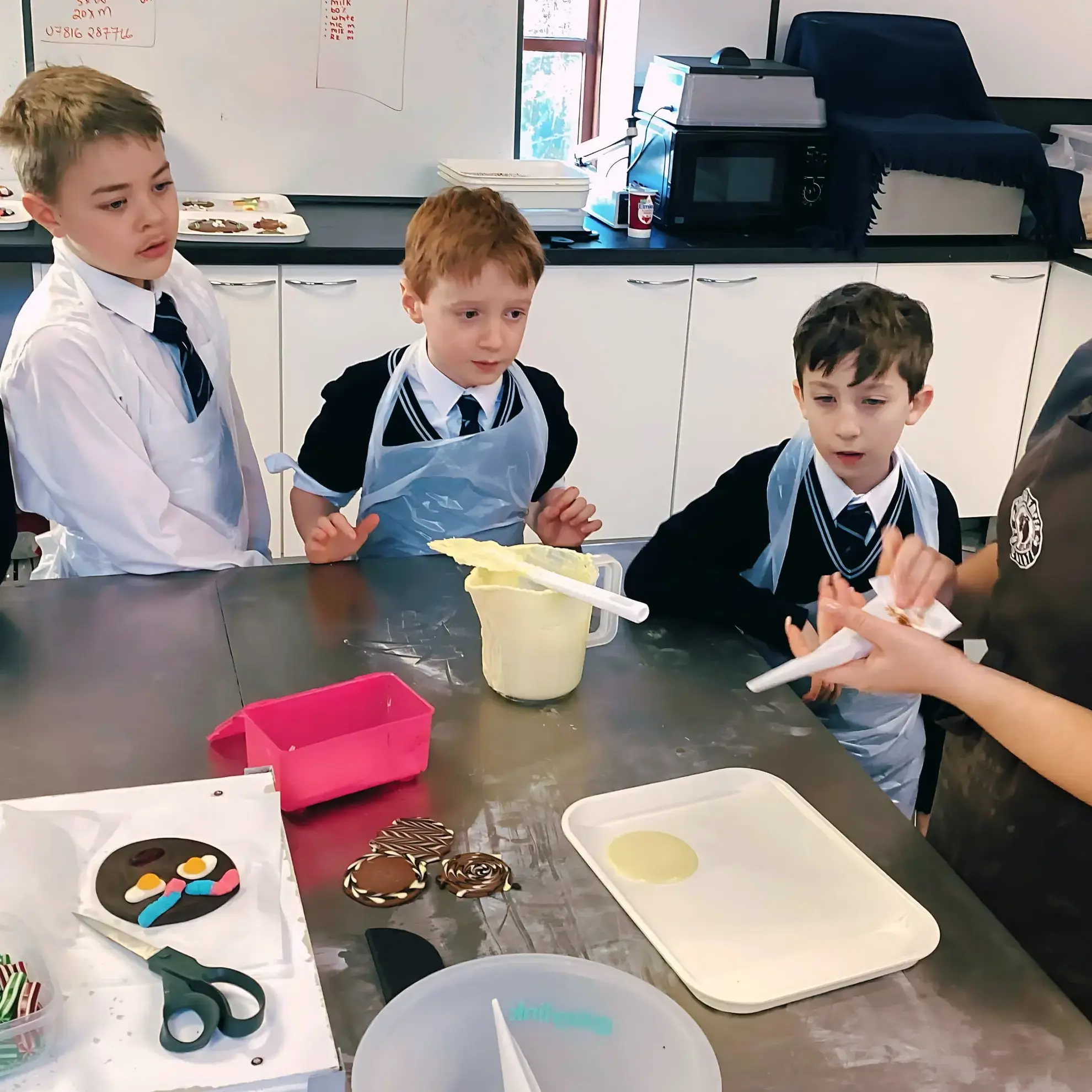 Students learning to make chocolate