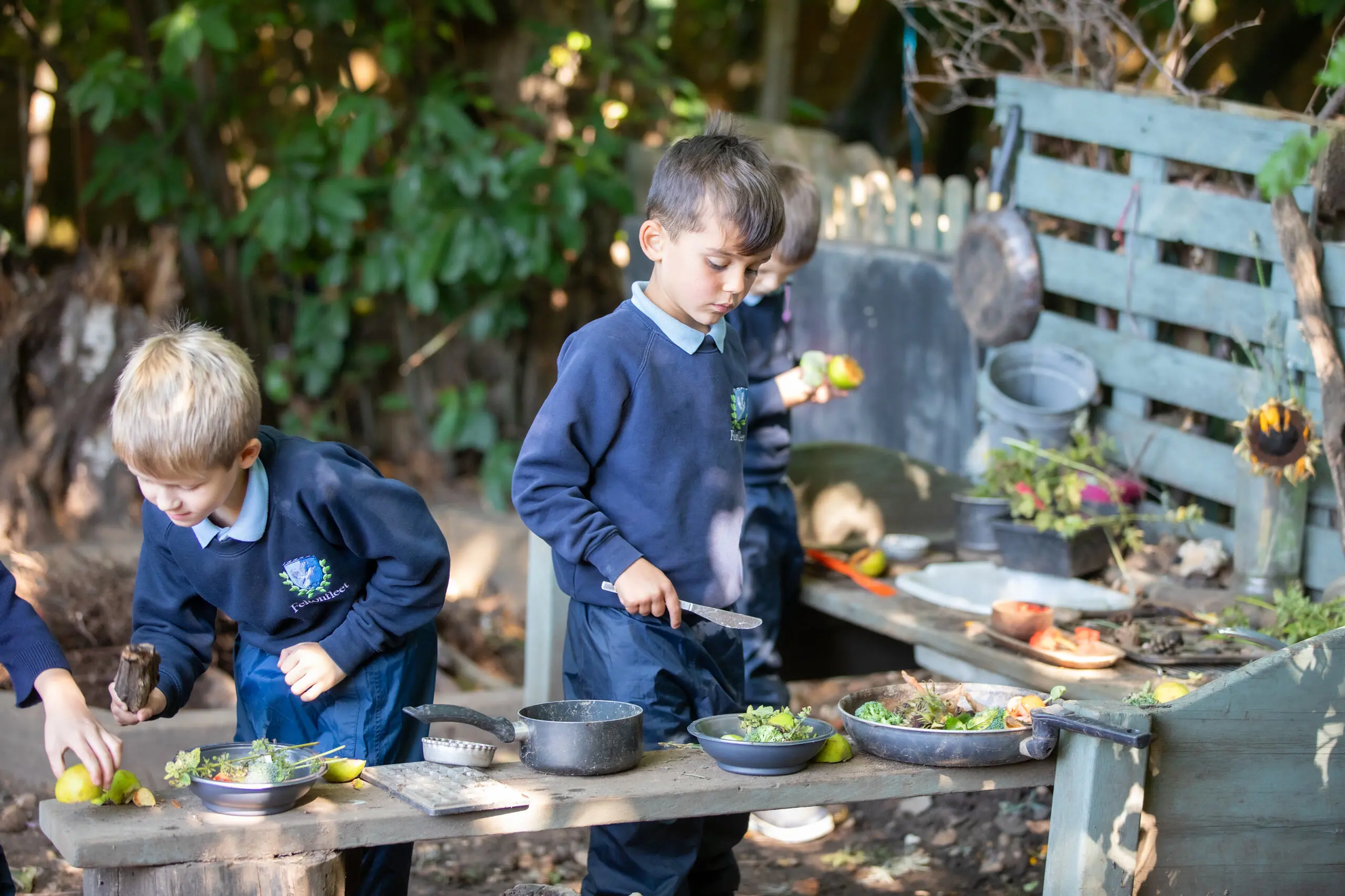 Students cooking outdoors
