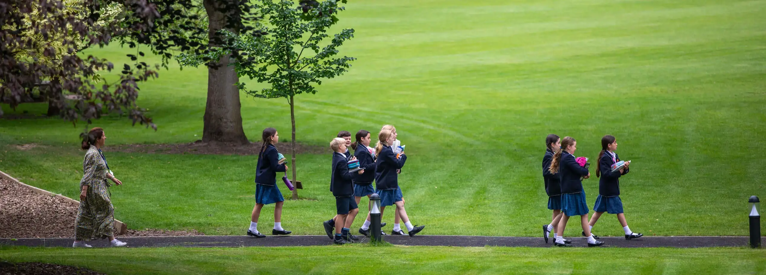 Students walking along a path