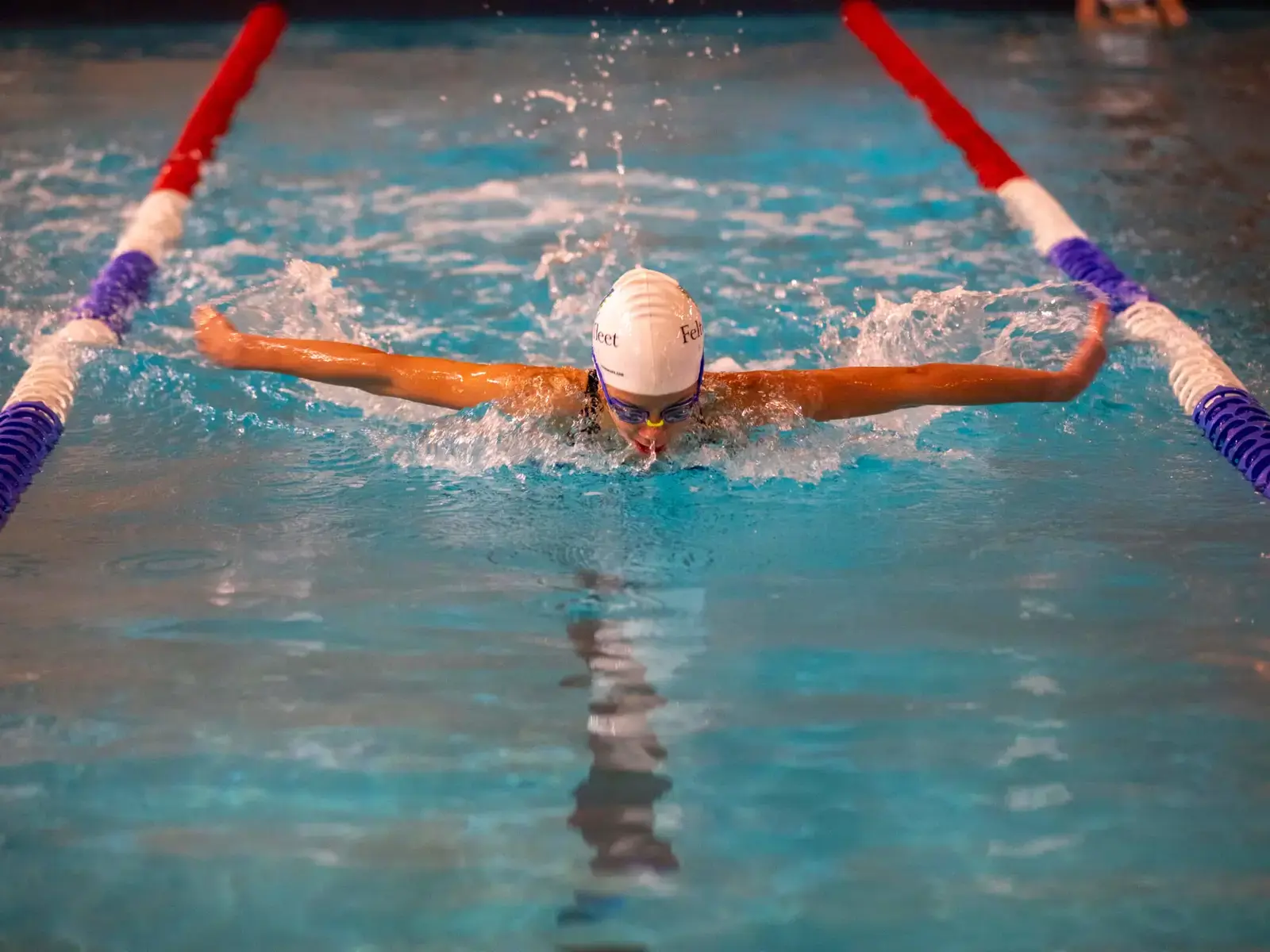 Sophia Samonas swimming at the ESSA Surrey Schools Championships, representing Feltonfleet, a private school in Surrey