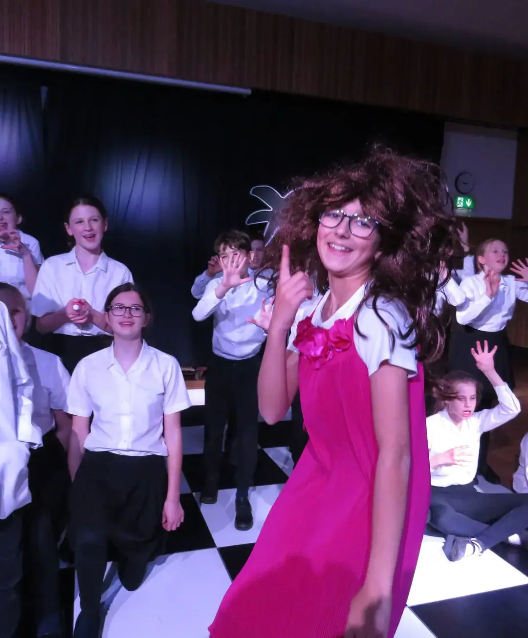 Students performing a production of Joseph