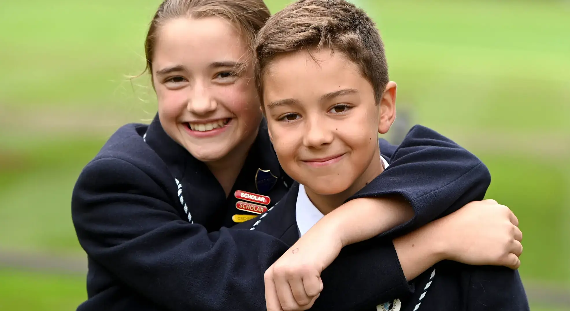 Two students embracing