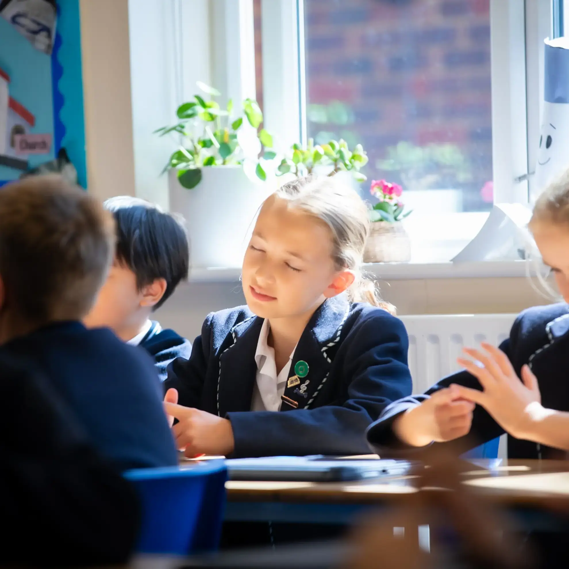 Students tracing their fingers with their eyes closed
